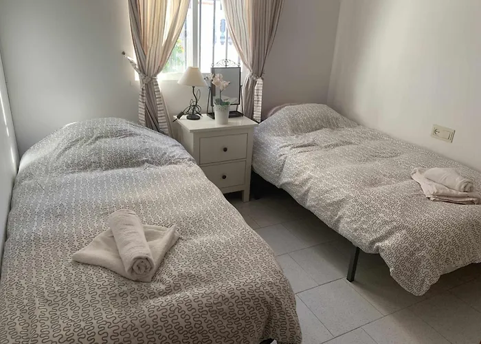 Hébergement de vacances Casa Kaluel Adosado Blanco